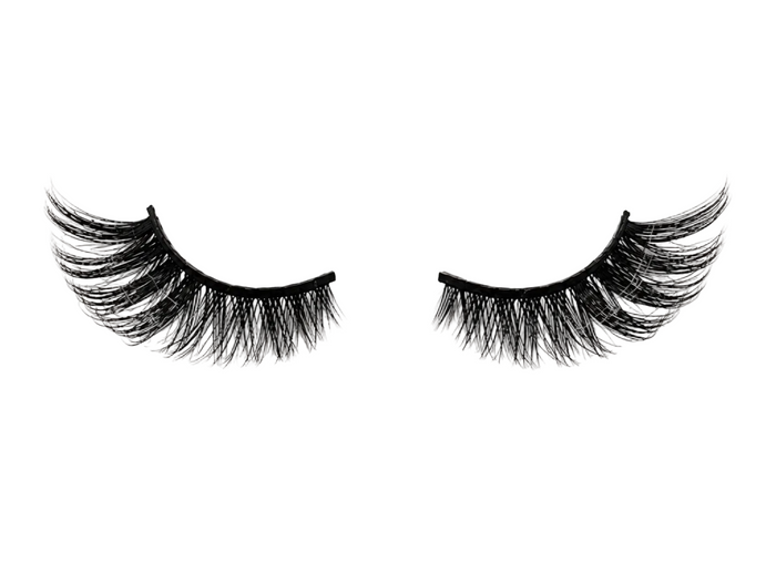 Model wearing Papillon de Nuit cat-eye strip lashes by Yalordé Lashes